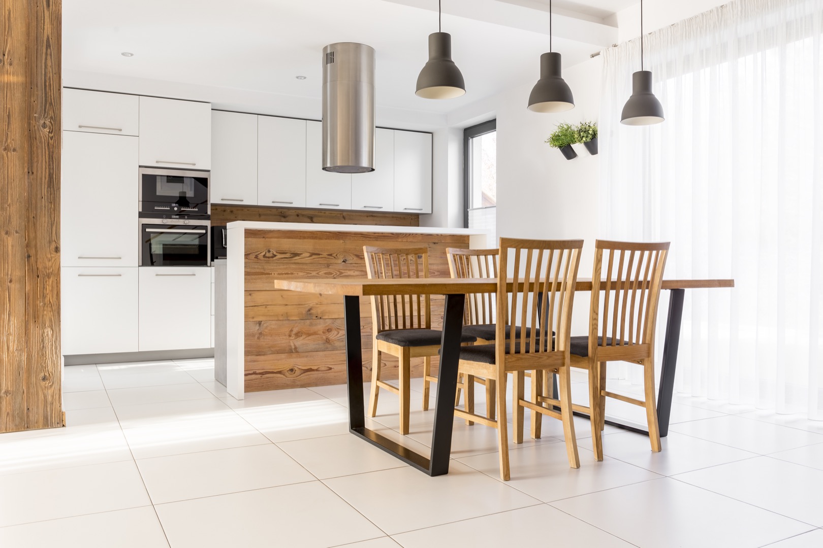 New white kitchen with table Modern day apartment